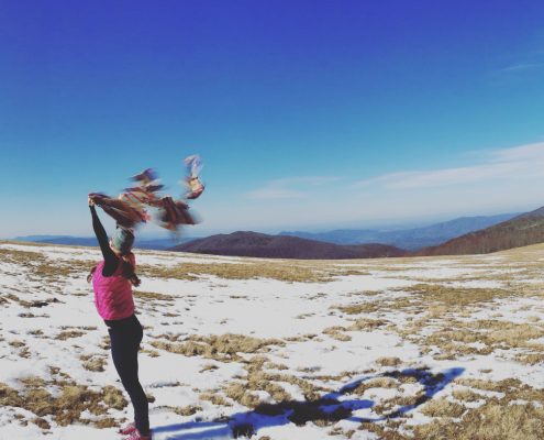 The grassy summit of Max Patch is a beautiful place to play in a windstorm.